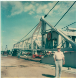 Tommie beside rig
